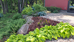 Residential Remus firepit flagstone professional landscaping lakeview michigan